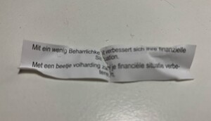 Glückskeksnachricht: „Mit ein bisschen Beharrlichkeit verbessert sich ihre finanzielle Situation.“ 